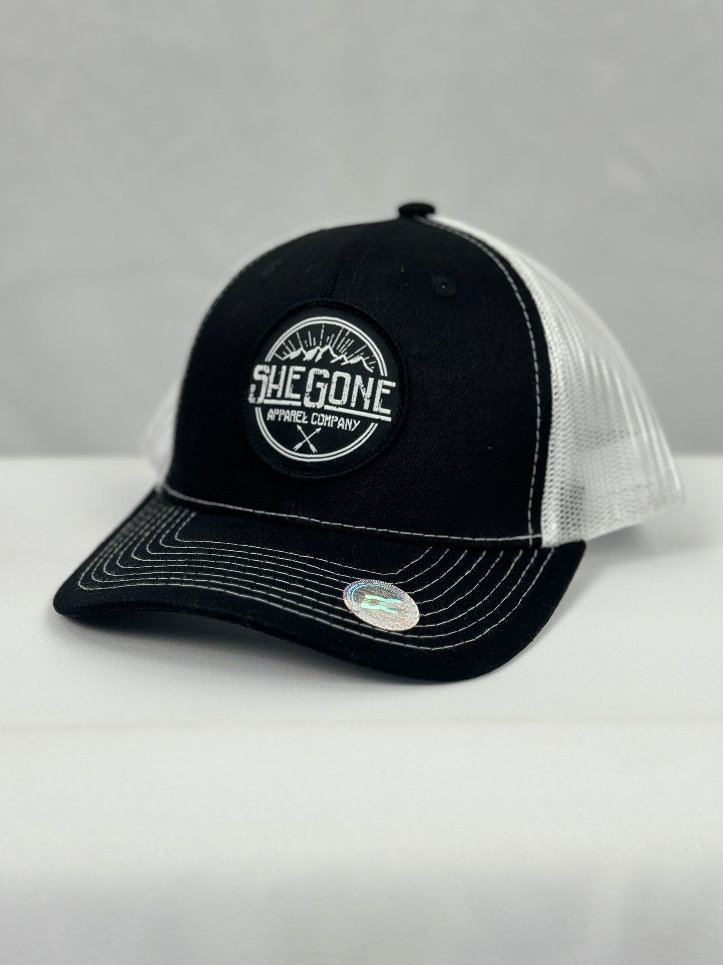 Woven SheGone Circle Patch on 112 Premium Trucker Cap - Black/ White