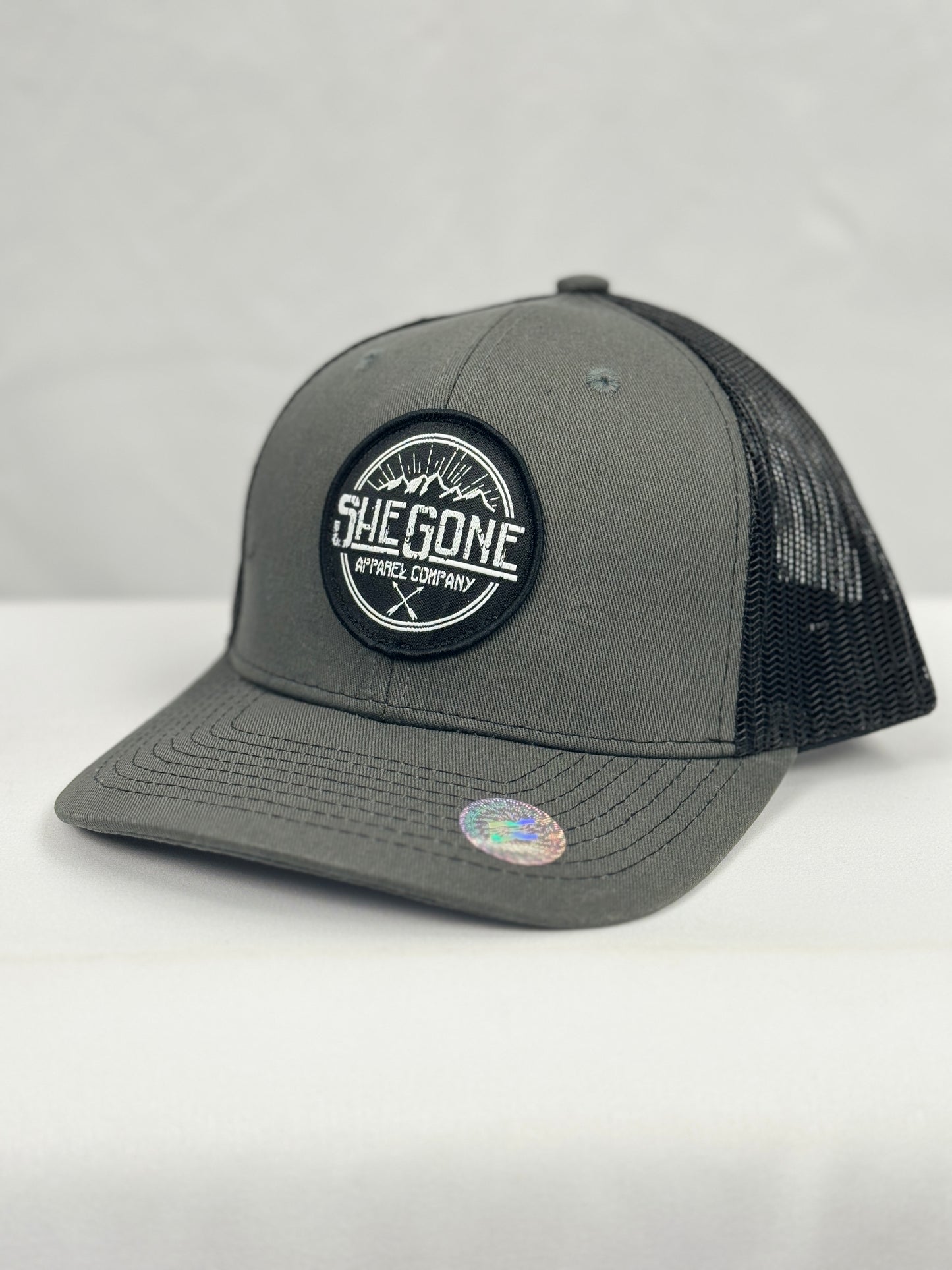 Woven SheGone Circle Patch on 112 Premium Trucker Cap - Charcoal/ Black