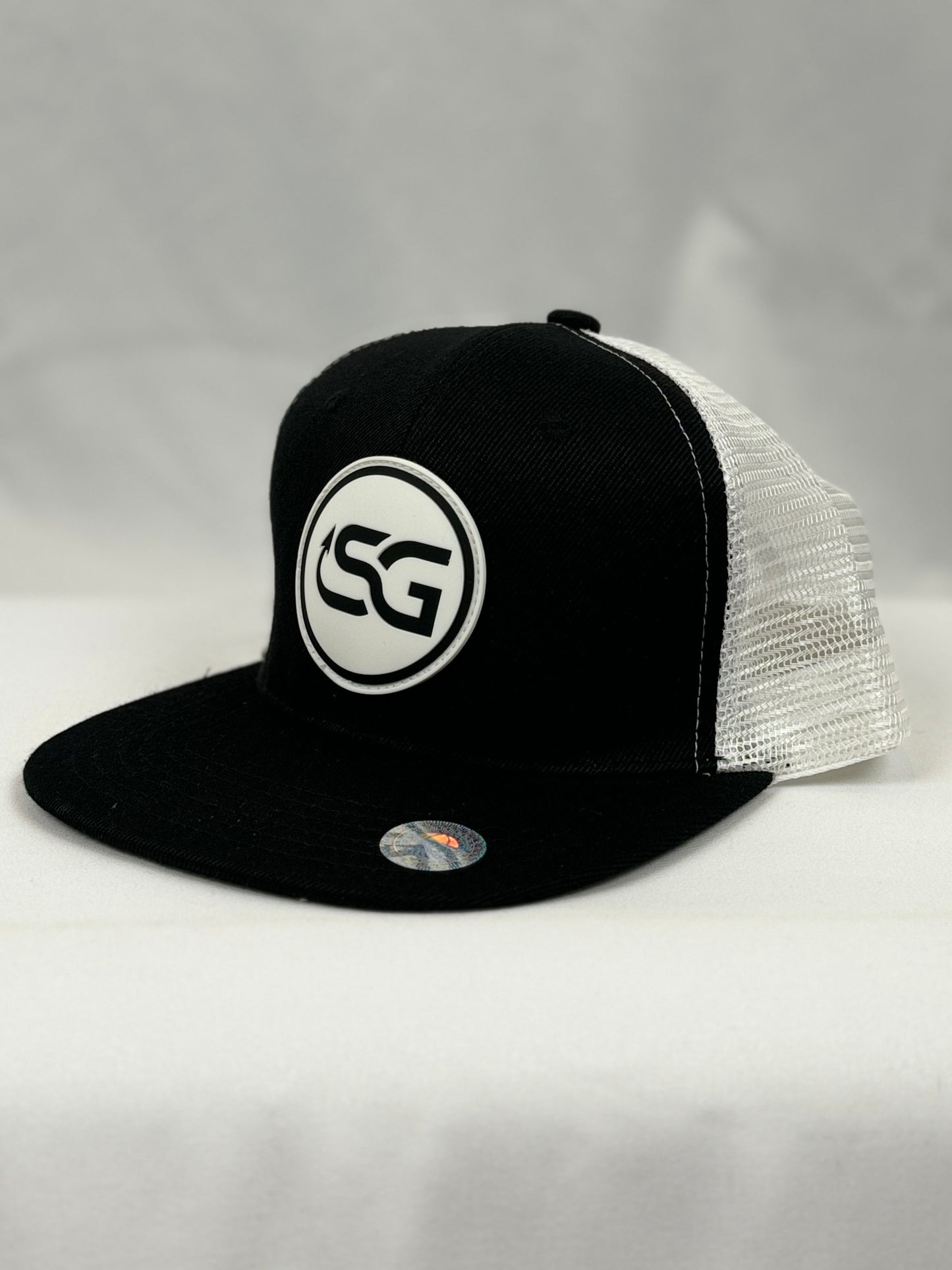 PVC Circle Logo on 8638 Flat Bill Trucker Cap - Black/ White